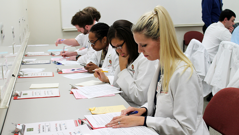PharmD students studying mock patient cases in the Communications lab in 2017