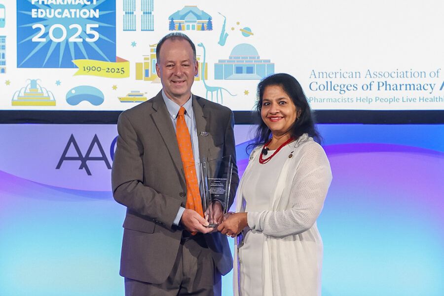 Dave Zgarrick receiving his award from Andi Law