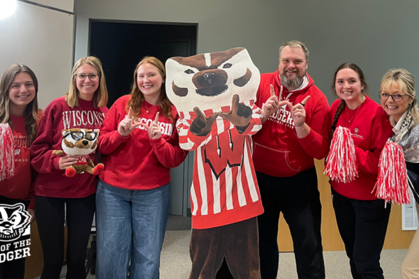 PharmD students and Professor Beth Martin (right) celebrate the Day of the Badger with Bucky