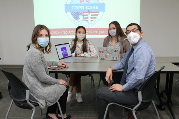 Jordyn Kettner, Ziting Zhang, Kelly Thomas, Ed Portillo working together on COPD CARE