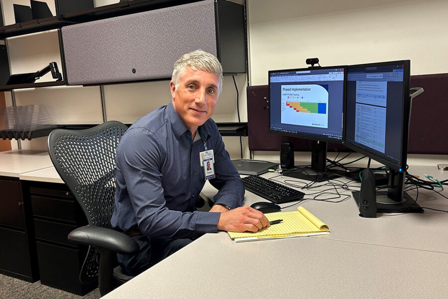 Tom Dilworth at his desk