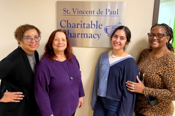 Yolanda Tolson with coworkers at the St Vincent de Paul charitable pharmacy