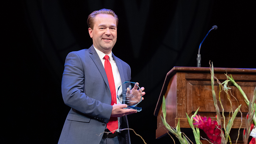Aaron Steffenhagen with his Larry Boh award