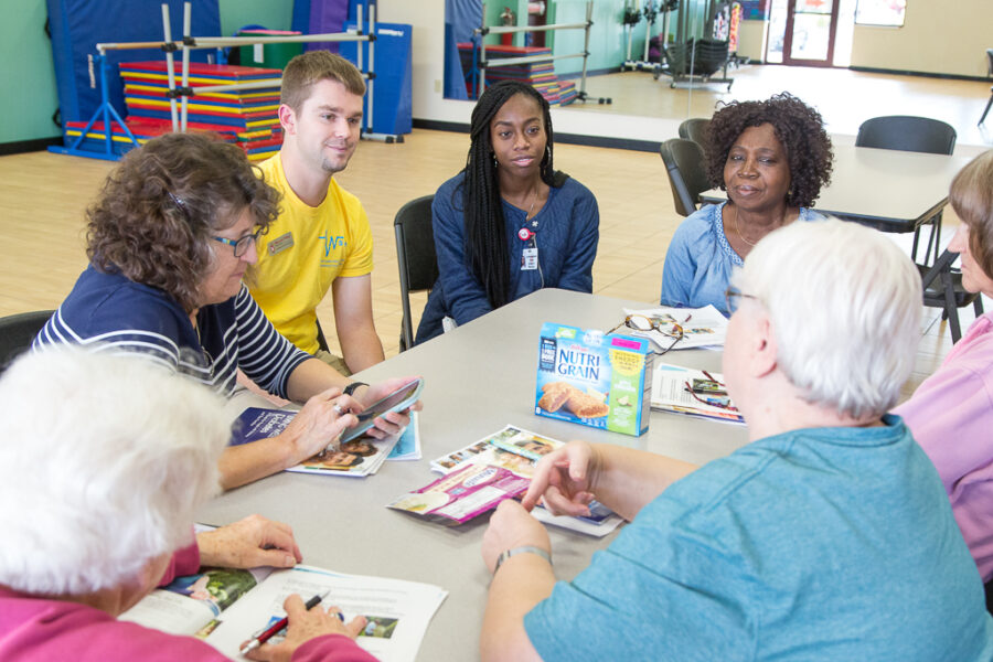 PharmD students in WSPS' Operation Diabetes holding a small group discussion with community members.